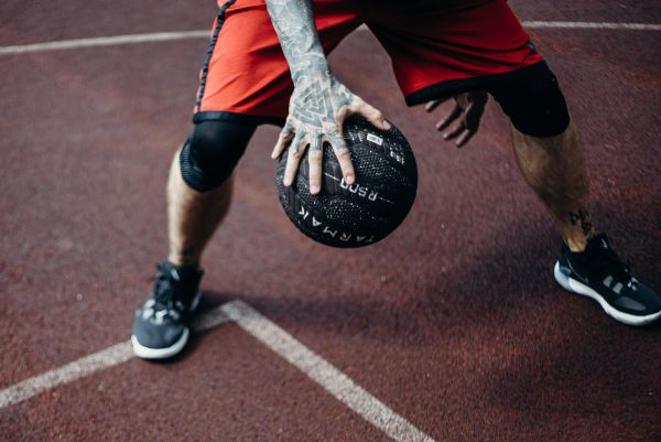 How can UK basketball players integrate strength and conditioning into their regular training?