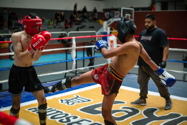 How can UK boxing coaches use video analysis to improve technique and strategy?